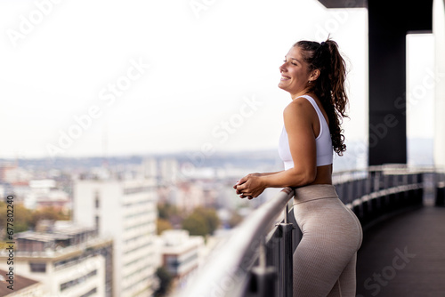 Athlete woman posing on terrace before exercise © pucko_ns
