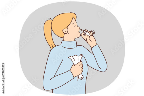 Sick woman use nasal spray