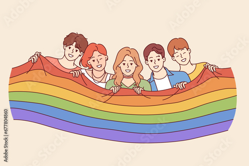 People with LGBT flag celebrating pride month or participating in gay and lesbian festival. Guys and girls wave LGBT flags calling on others to join queer community to fight for gender equality