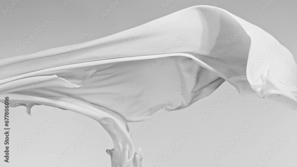 White transparent silk fabric flowing by wind, super slow motion. Fiilmed on high speed cinematic camera at 1000 fps. White transparent silk fabric flowing by wind, super slow motion. Fiilmed on high speed cinematic camera at 1000 fps.