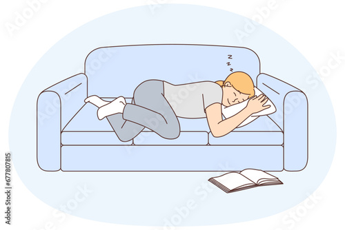 Young woman sleeping on sofa
