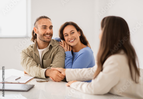 Portrait Of Millennial Couple Buying New Apartment
