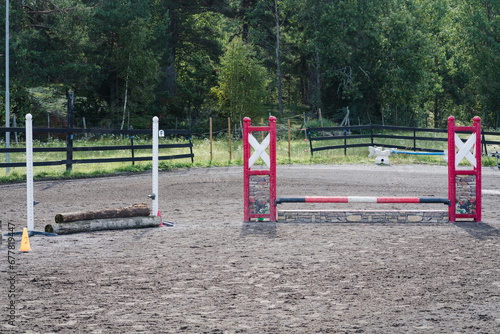 Two equestrian sport gates on the field.