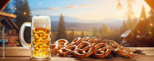 bavarian oktoberfest pretzels on wooden table with beer from Germany. photo