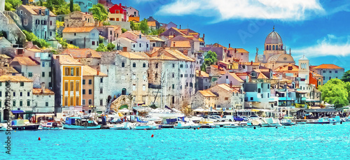 Beautiful old medieval mediterranean hill  village harbor  at turquoise blue adriatic sea in summer - Sibenik, Croatia photo