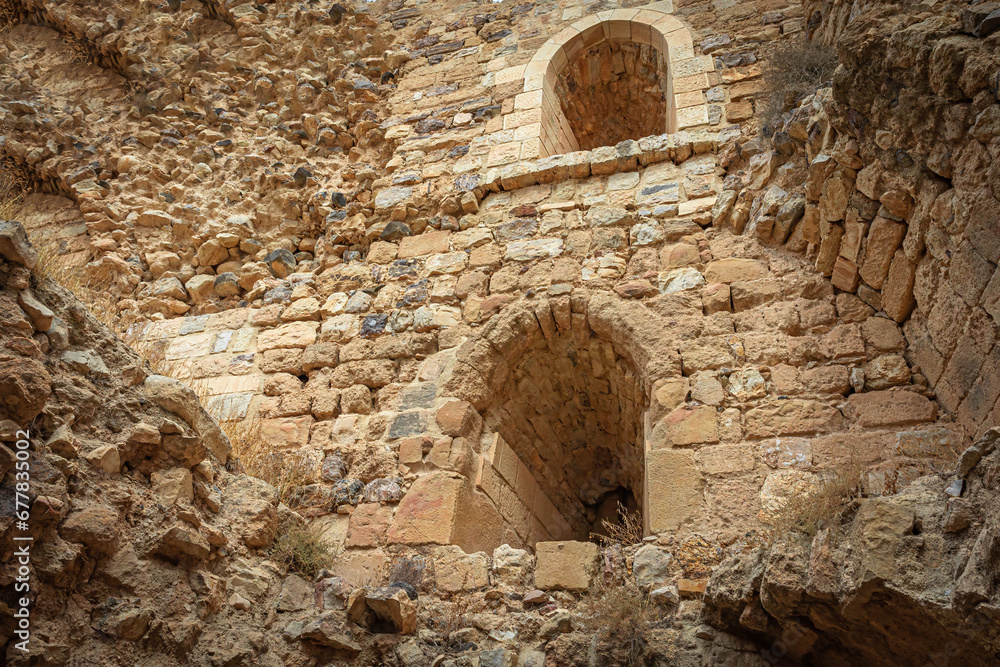 Interior of ruins of medieval Kerak Castle. Edited as a vintage photo. Jordan. 