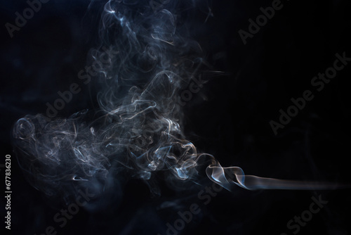 Abstract smoke on black background. Freeze motion vape clouds	