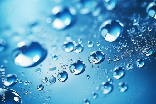 Water drops on blue background macro shot. 