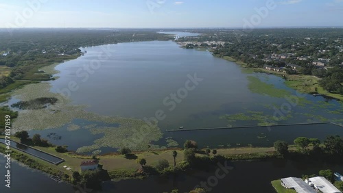 Lake Seminole of Pinellas County, Florida is shown in an aerial, daytime flyover view. photo