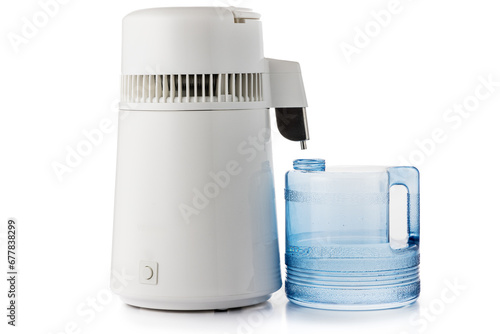 Billede på lærred Distiller machine with water bottle isolated on white background
