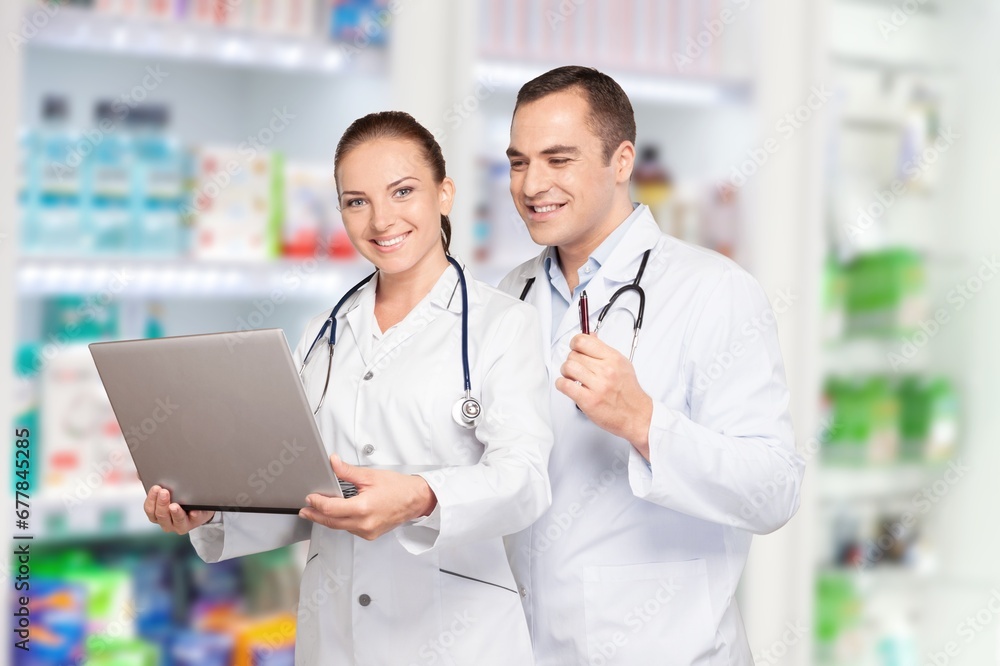 Pharmacy portrat of young woman and man for medicine management Pharmacy portrat of young woman and man for medicine management