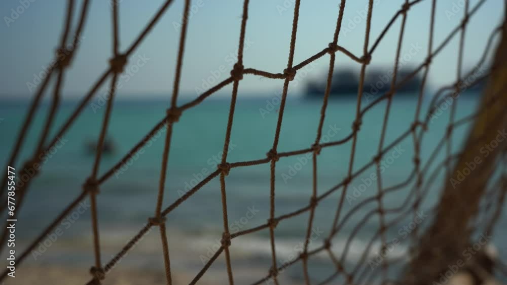 Fishing net against the background of the sea Fishing net against the background of the sea