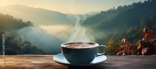 A cup of fragrant coffee set against a scenic backdrop