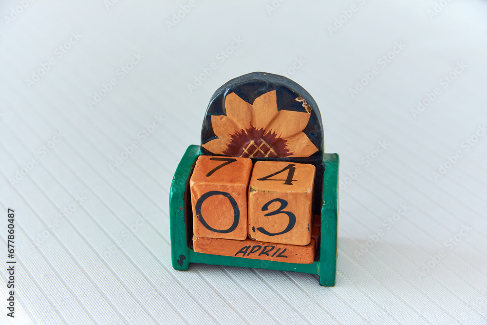 daily and monthly calendar made of wooden pieces