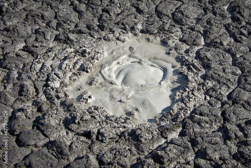 cones of mud volcanoes from which rivers of mud flow