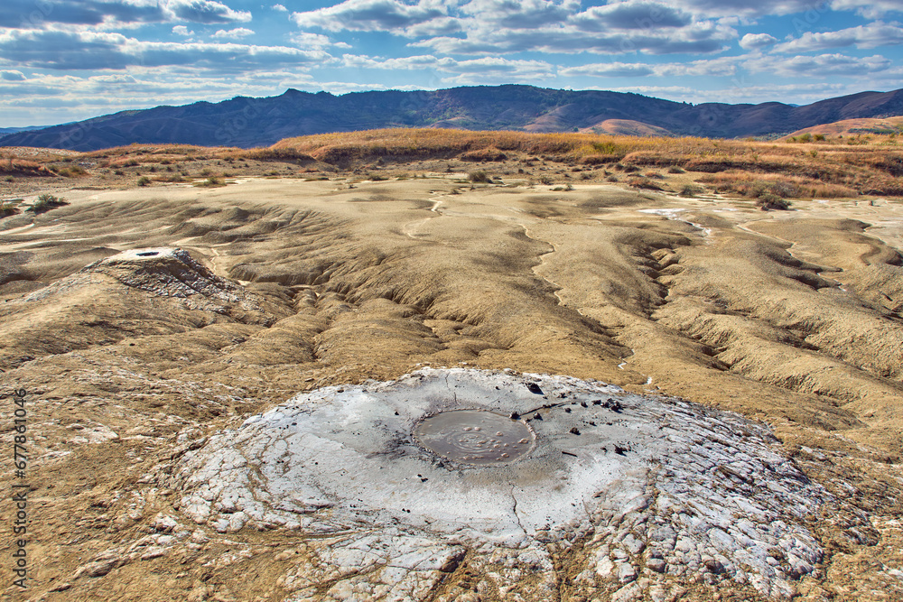 cones of mud volcanoes from which rivers of mud flow