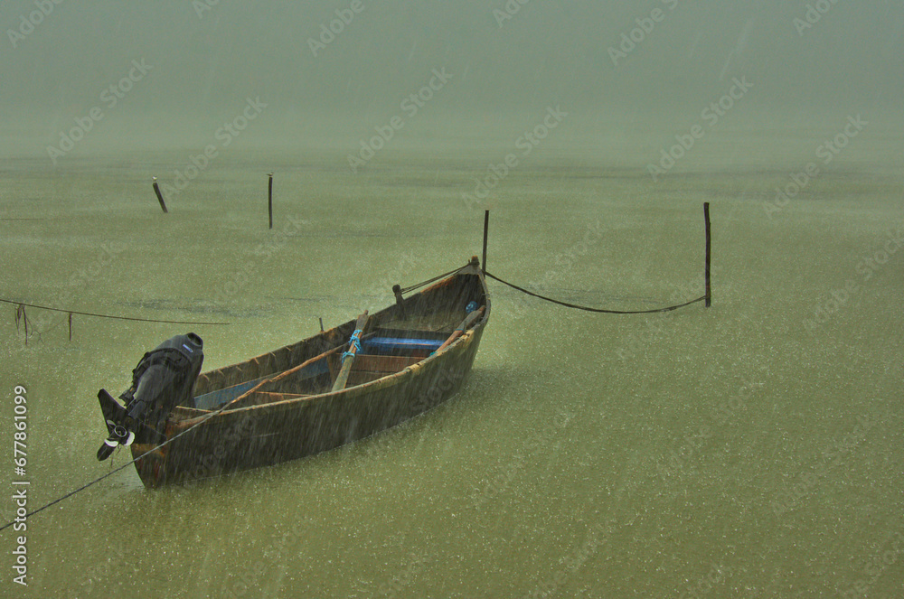 fishing boats at sunrise on the lake