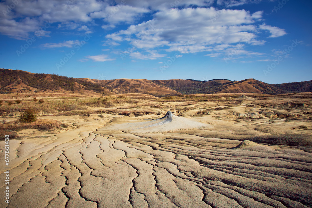 cones of mud volcanoes from which rivers of mud flow