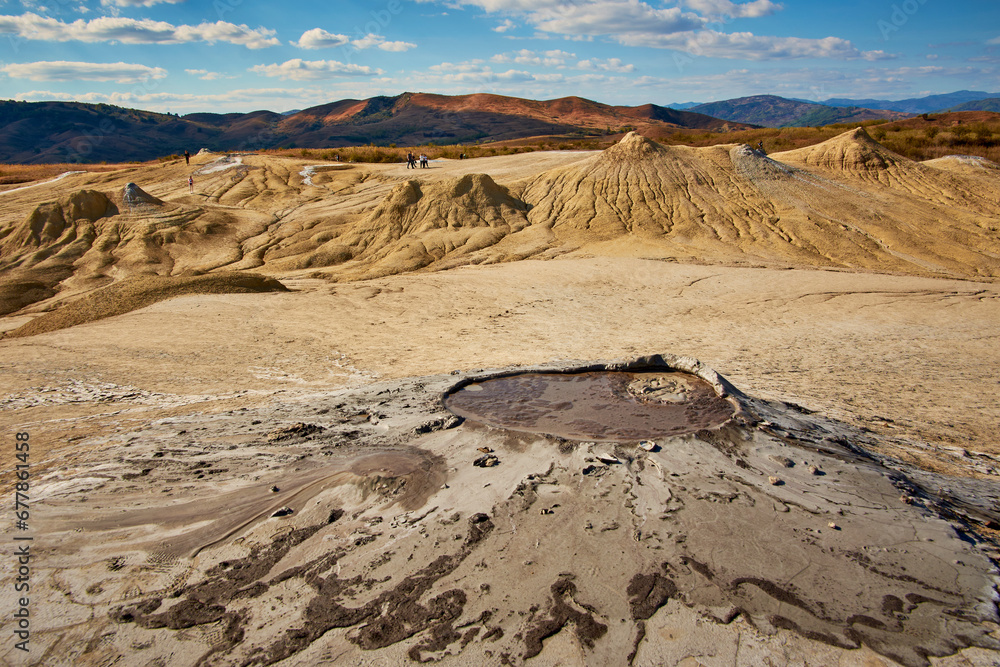 cones of mud volcanoes from which rivers of mud flow