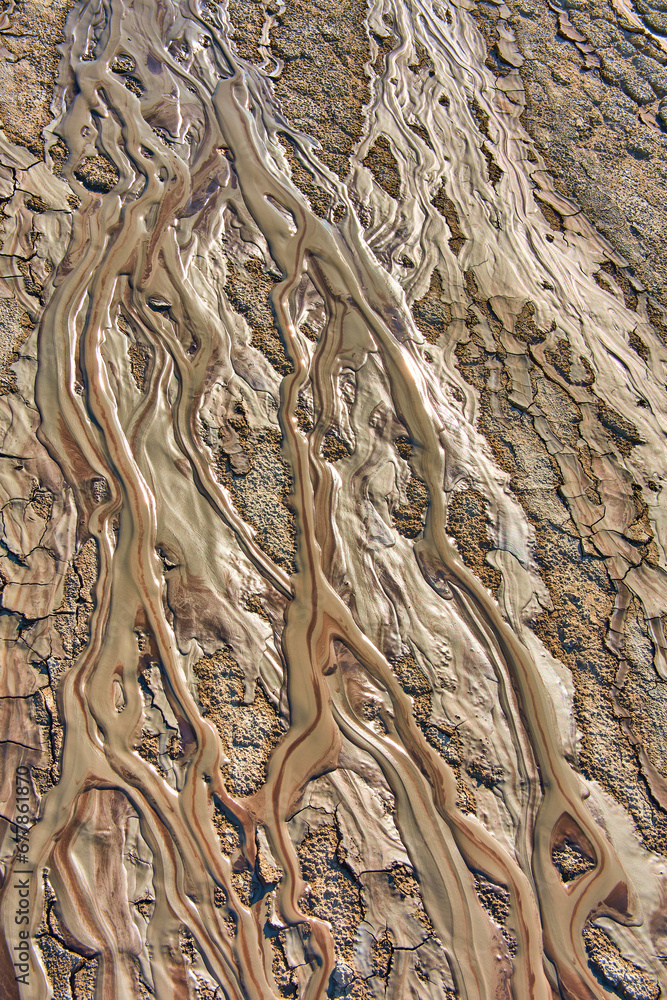 cones of mud volcanoes from which rivers of mud flow