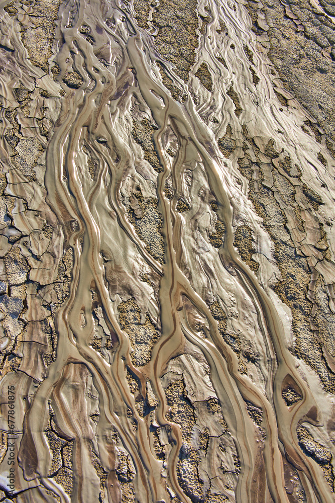 cones of mud volcanoes from which rivers of mud flow