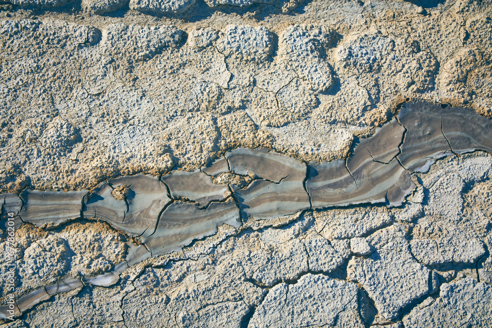 cones of mud volcanoes from which rivers of mud flow
