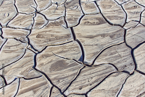 cones of mud volcanoes from which rivers of mud flow