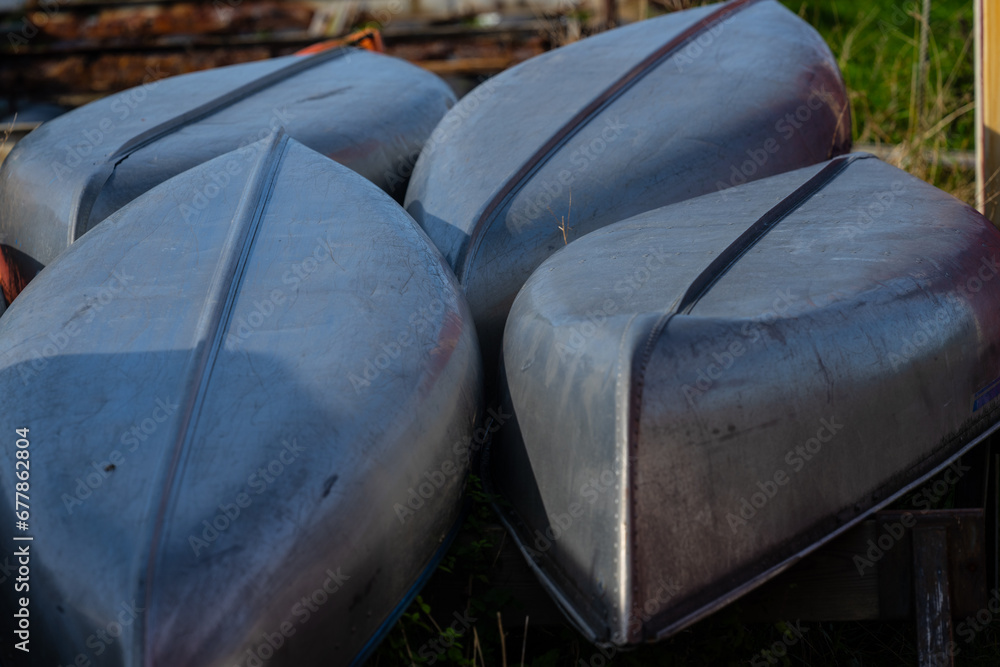 Aluminium canoes laid up for the winter. Aluminium canoes laid up for the winter.