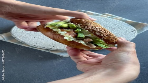 bagel with cream cheese and smoked salmon. Pastry and home cooking concept. 