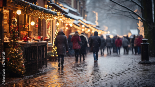 People walk through the Christmas market in the evening. Golden bokeh with space for text