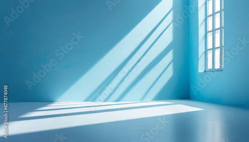 minimal abstract light blue background for product presentation shadow and light from windows on wall