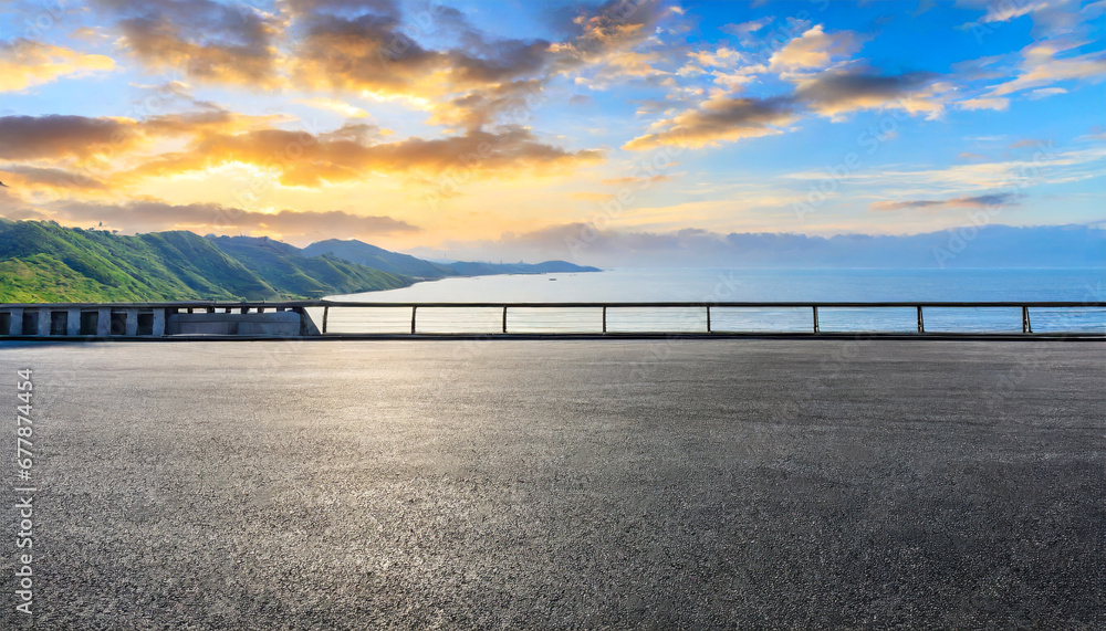 asphalt road platform and beautiful coastline nature scenery at sunrise