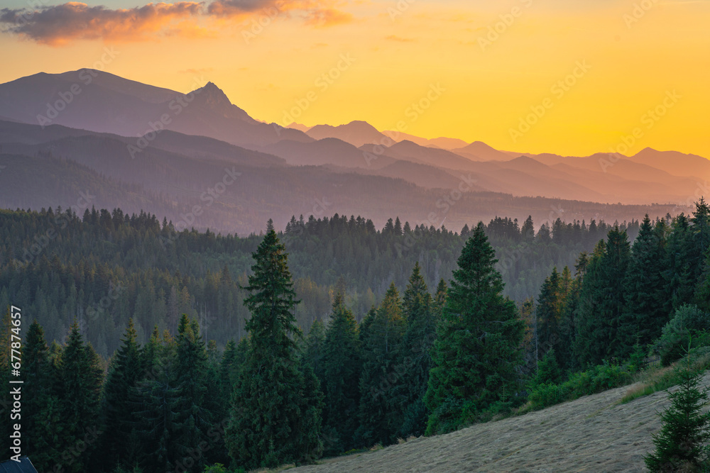 Sunset over Tatra mountains seen in August evening