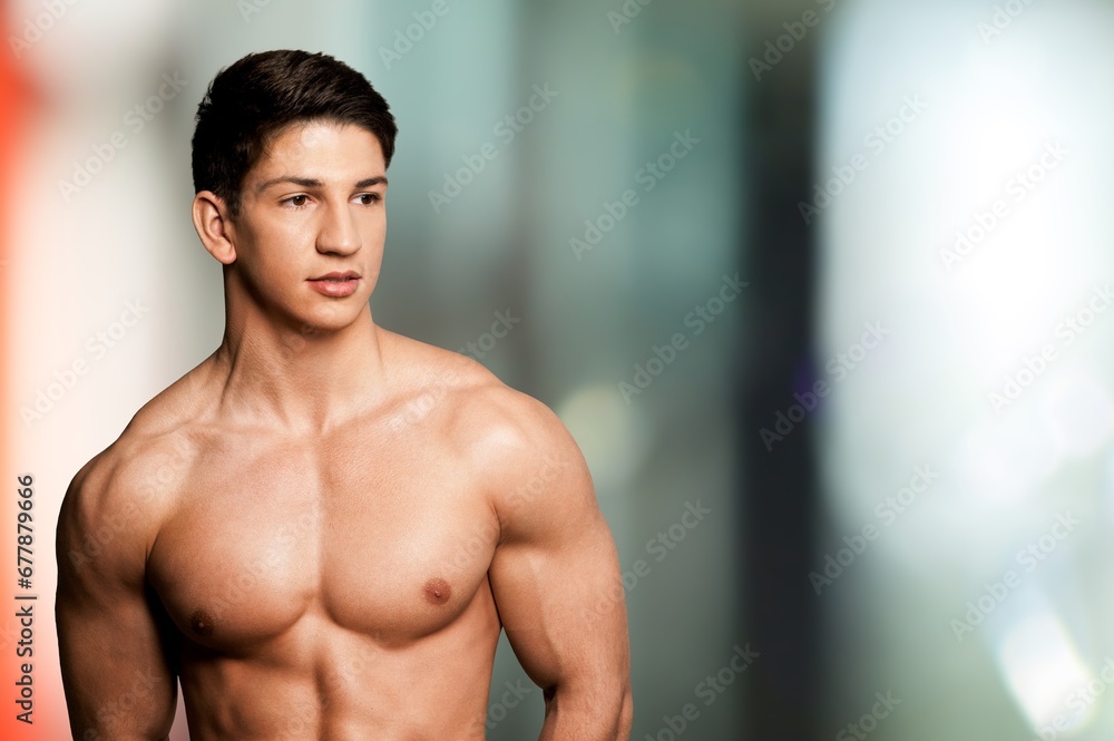Portrait of a handsome happy young man studio shot. Portrait of a handsome happy young man studio shot.