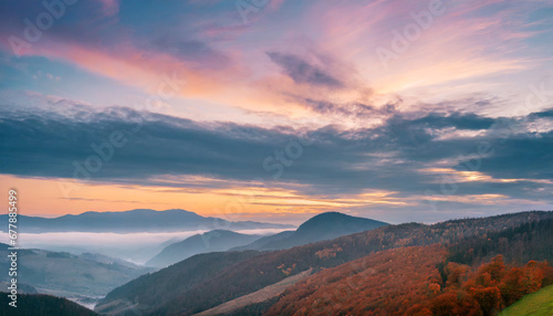 autumn sunrise cloudy sky over mountains abstract colorful peaceful sky background © Art_me2541