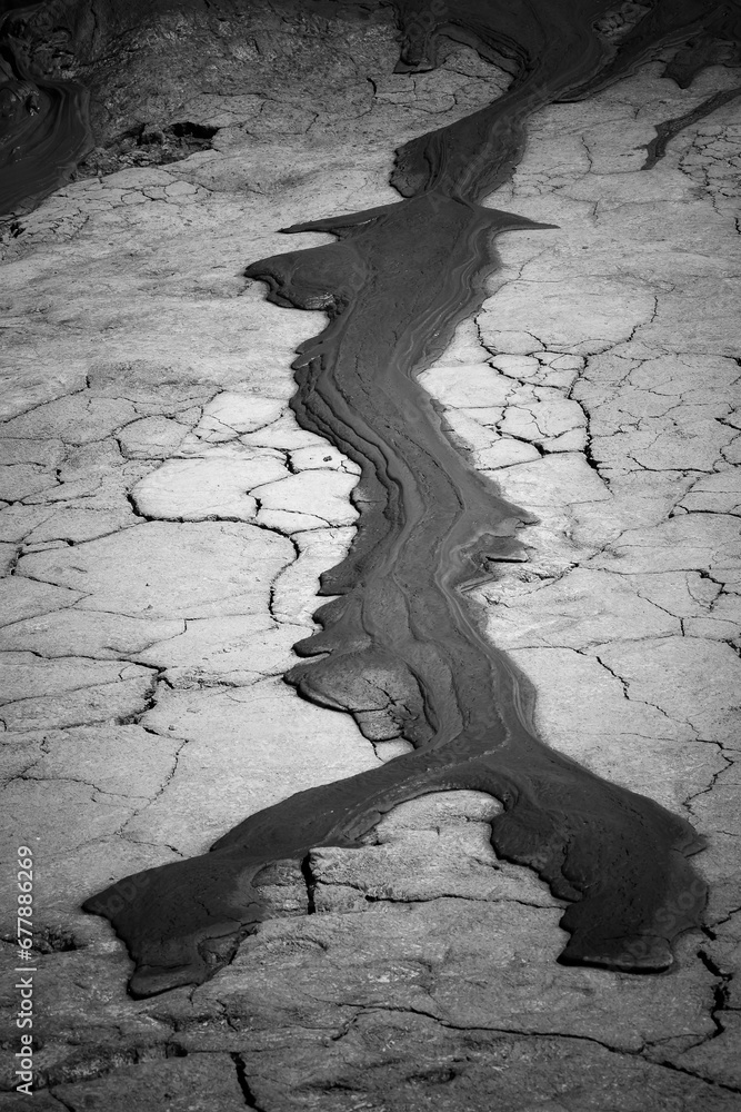 cones of mud volcanoes from which rivers of mud flow