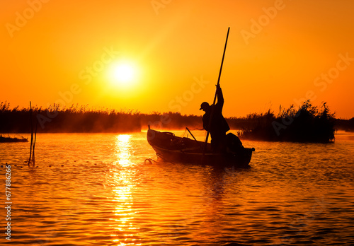 Obraz na płótnie raised with a fisherman in the Danube delta w salonie