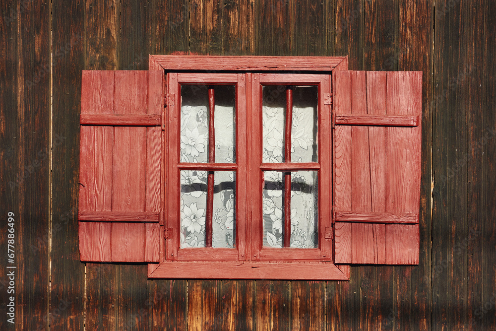 the wooden window of a peasant house