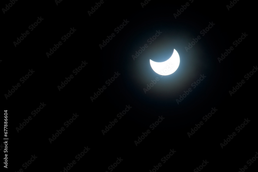partial solar eclipse in the sky