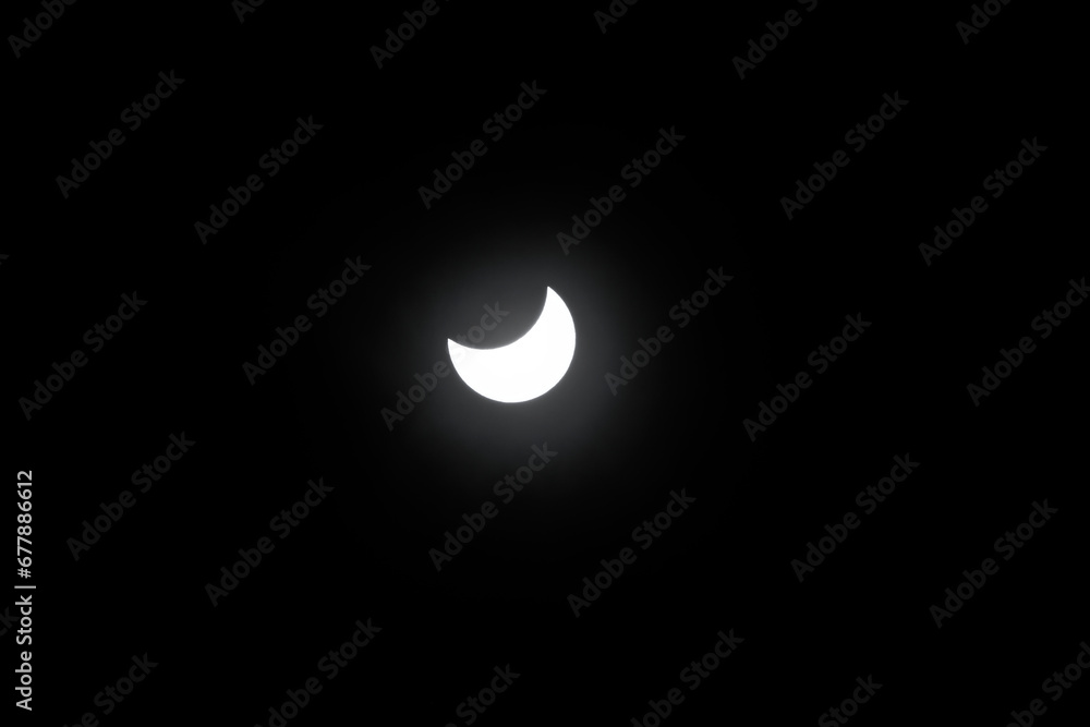 partial solar eclipse in the sky