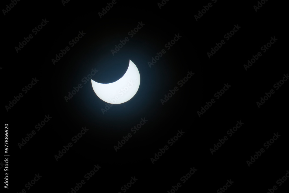 partial solar eclipse in the sky