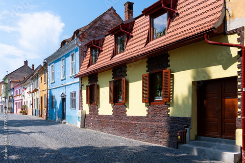 Traditional multi coloured houses in old town, Sibiu, Transylvania, Romania photo