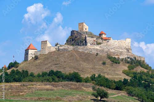 Rupea Fortress (Cetatea Rupea) on a basalt cliff, Brasov, Transylvania, Romania photo