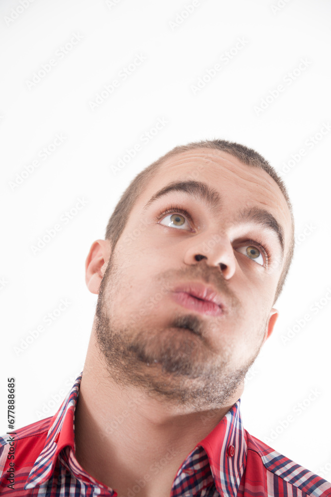 Fototapeta premium Exasperation clear, upward glance, stubble