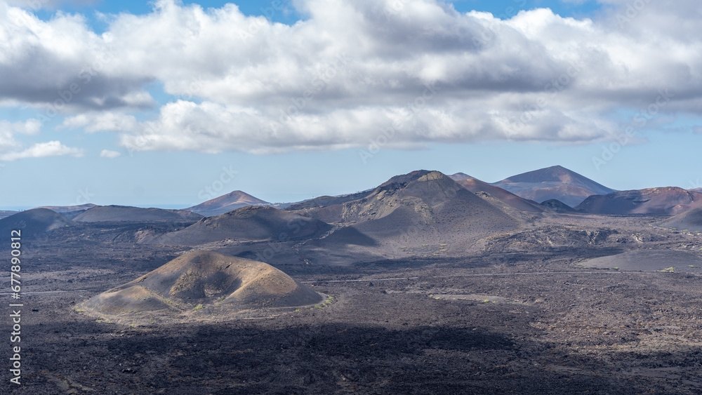 The lunar landascape of lava with the vulcanos in Lanzarote, canaries, view of the Timanfaya national park