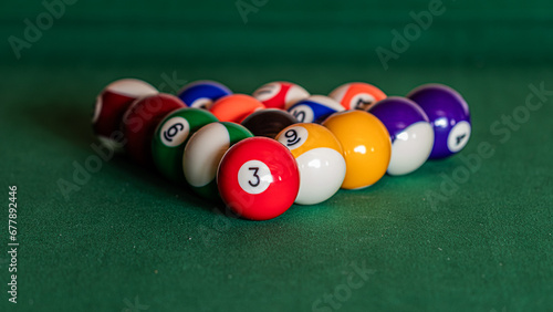Fényképezés Close-up of a pool table with vibrant billiard balls, inviting a game of precisi