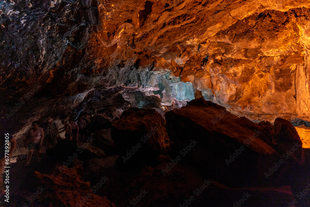 cueva de los verdes, colorful vulcanic rocks in cave with lake still calm reflecting, lava tube in Lanzarote, Canary Islands