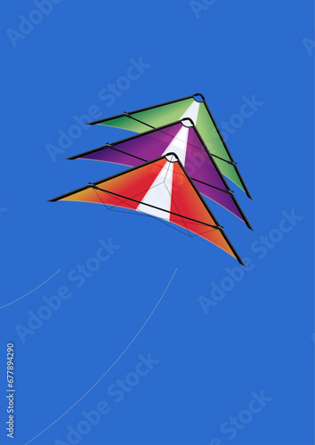 Stacked stunt power kites against a blue sky.