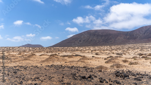 View of la Graciosa island close to lanzarote, canary island spain, with only dirt roads and old volcano