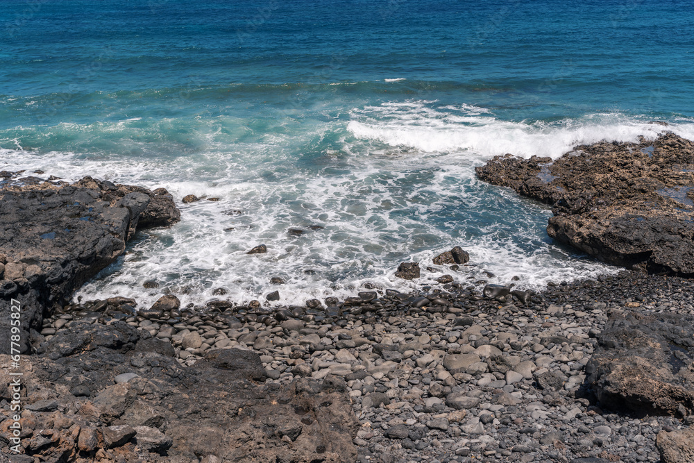 ocean waves breaking on secluded rocky cove ocean waves breaking on secluded rocky cove